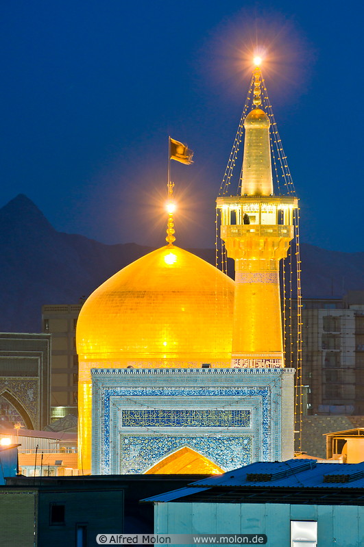 22 Golden dome and minaret at night