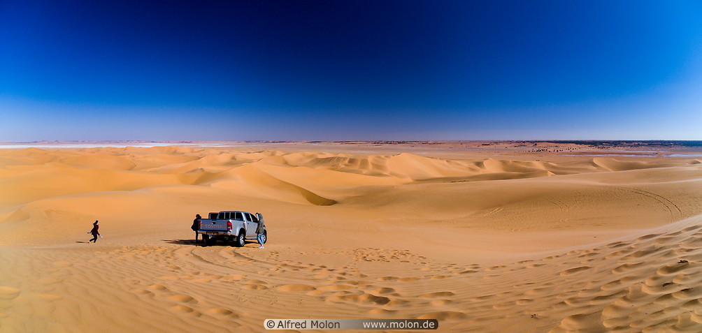 47 Sand dunes and 4WD car