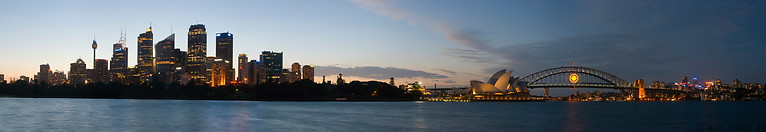 13 Business district, opera house and harbour bridge at dusk