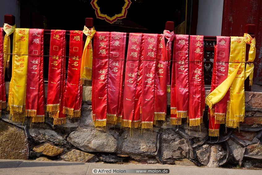 10 Red and yellow prayer cloths