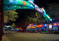 25 Street at night with neon lights and decorations