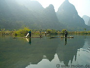 10 Fishermen on bamboo boat on Yulong He river