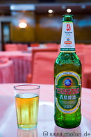 11 Green Tsingtao beer bottle and glass