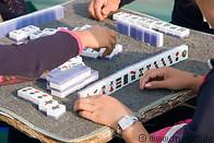 18 Chinese tourists playing Mahjong