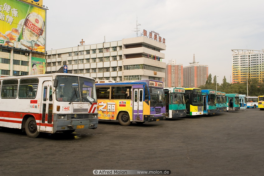 17 Buses parked at the train station
