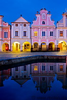 14 Reflections of houses in fountain at night