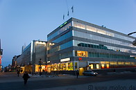 11 Pedestrian area with shops at dusk