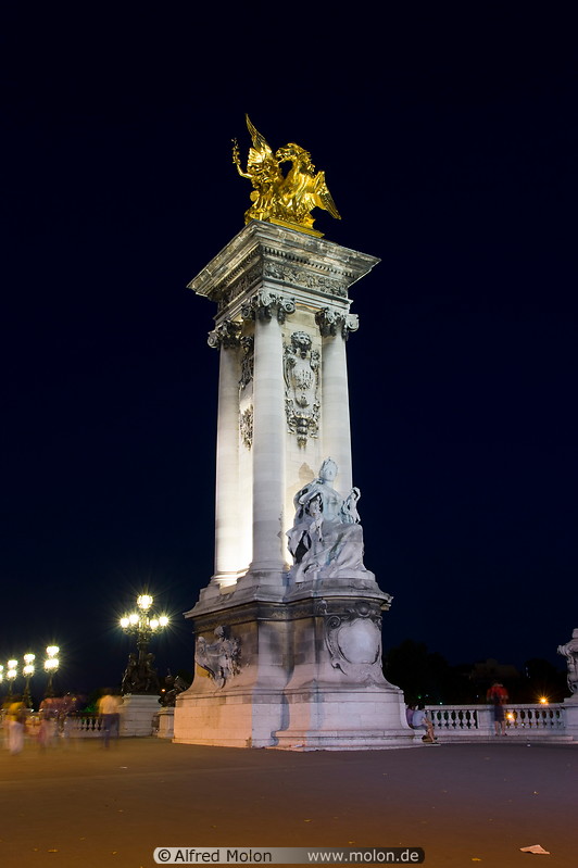 18 Gilded statue on column