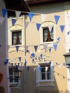 05 Bavarian style house with white and blue flags