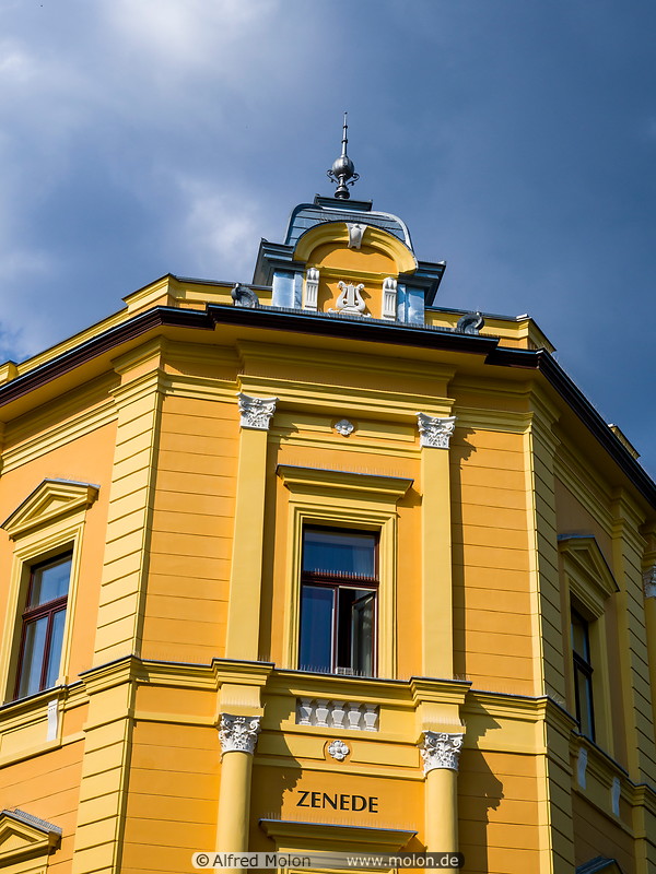 16 Yellow Zenede building