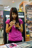05 Girl in mobile phone shop