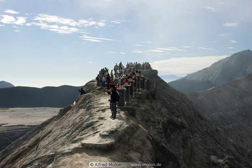 17 Tourists on Mount Bromo volcanic cone edge