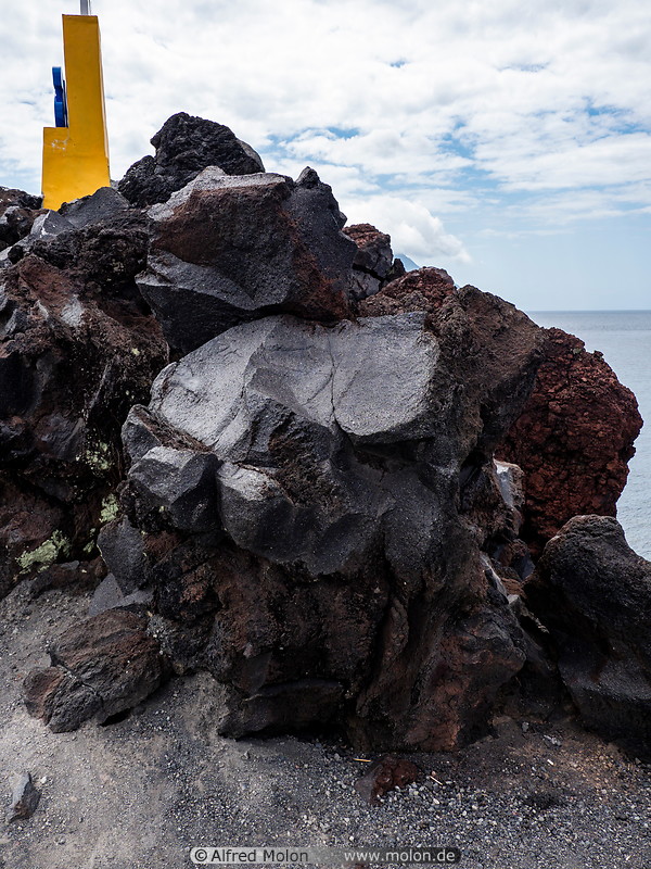 22 Black lava rocks in Batu Angus