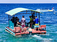 13 Boat with tourists in Olele marine park