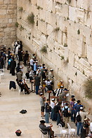 21 Jews praying along wall