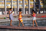 15 Girls playing at fountain