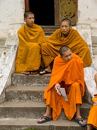 03 Novice monks sitting on staircase