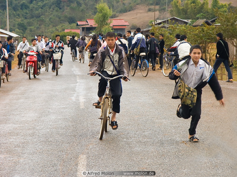 19 Schoolchildren riding bicycles back home