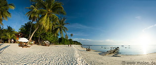 12 White coral sand beach with coconut palms