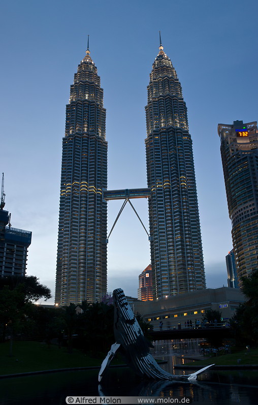 12 Petronas towers at dusk