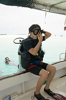 06 Diver preparing for back jump into sea