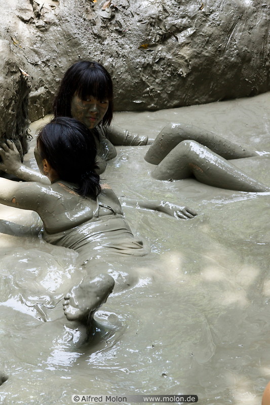 06 Tourists bathing in mud volcano