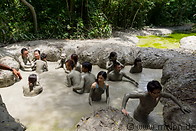 09 Tourists bathing in mud volcano