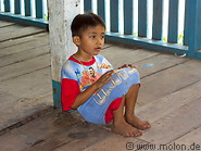 32 Kajang child in the longhouse