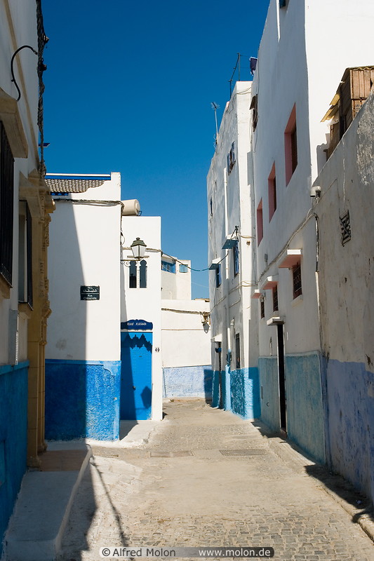 08 Alley with white and blue houses