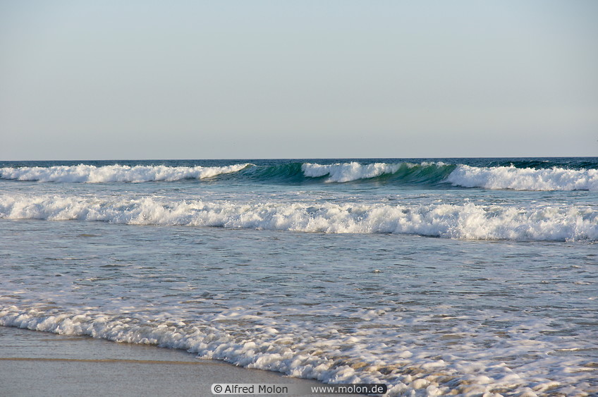 35 Waves breaking on sandy beach
