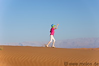 08 Girl running on sand dune
