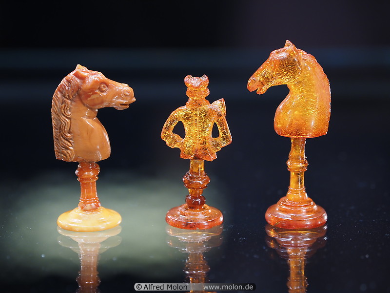14 Amber chess pieces