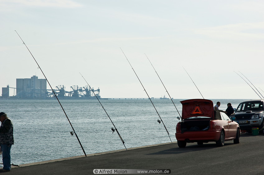 08 Fishing rods along waterfront