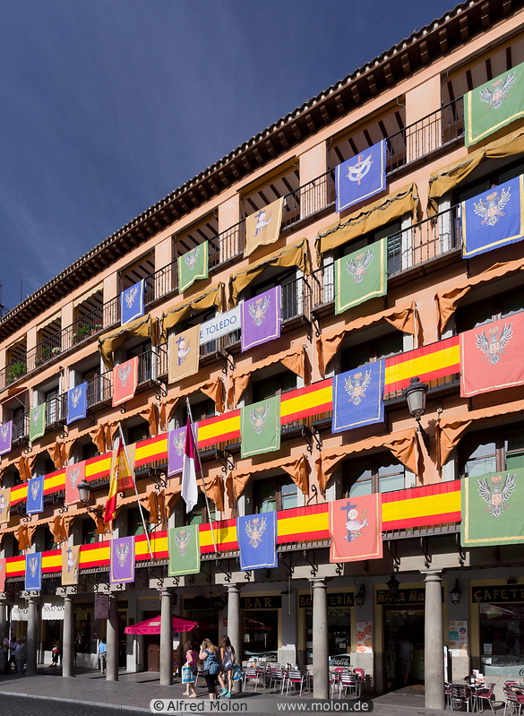 12 Colourful flags on Zocodover square building