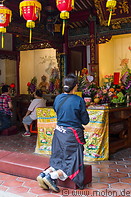 16 Woman praying in City God temple