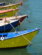 06 Bows of colourful boats