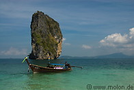 01 Long tail boat and karst rock stack