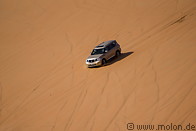 14 Off-road car on sand dune
