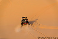 26 Sandrail driving on sand dune