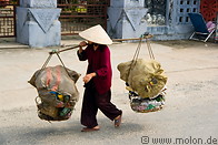 02 Old man carrying heavy baskets