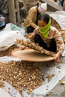 16 Cleaning dried mushrooms on street