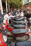 10 Motorbikes parked on pavement