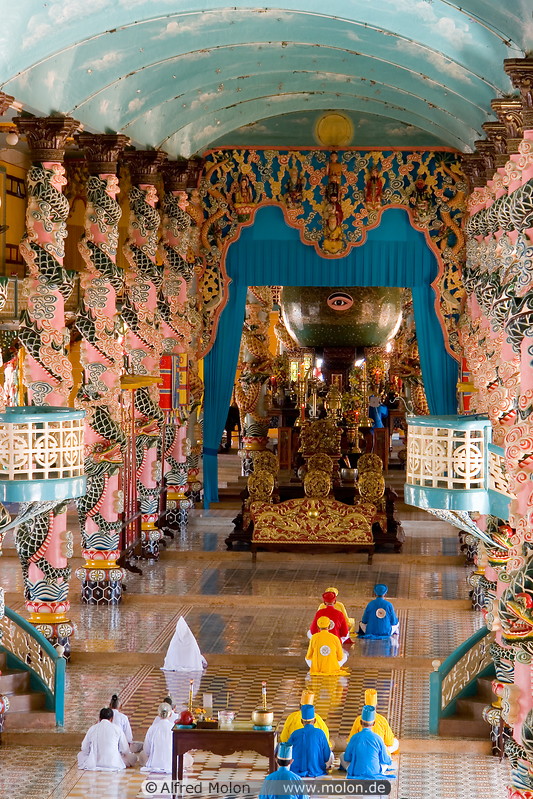 10 Frontal part of Cao Dai temple with priests and sphere