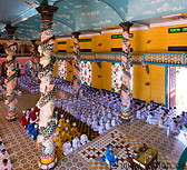 25 Interior of Cao Dai Great Temple and worshippers